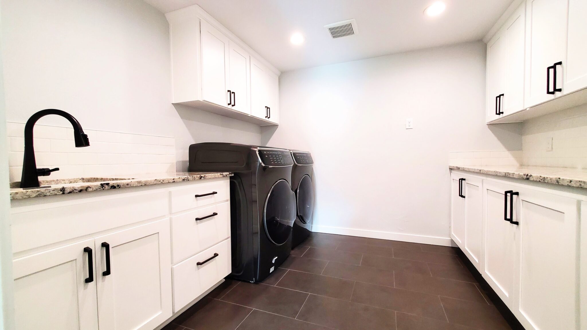 We even painted the cabinets in the laundry room.