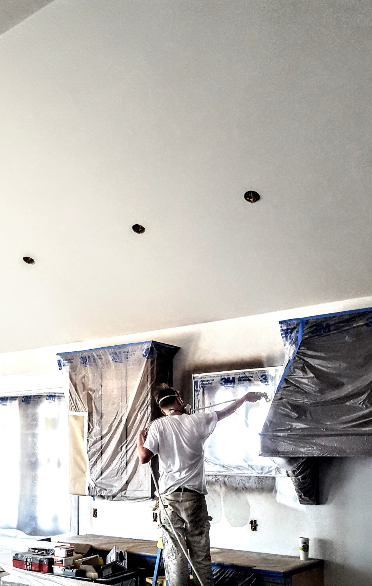 Applying primer to the walls